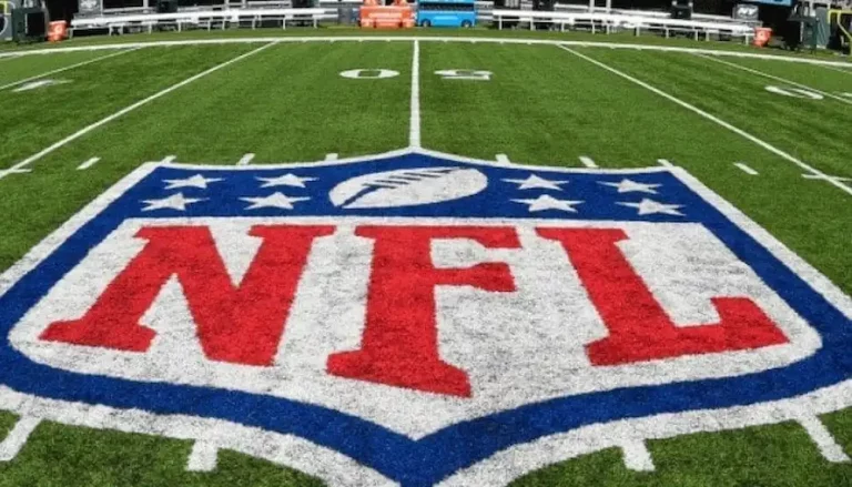 The NFL logo is prominently displayed at the center of the football field.