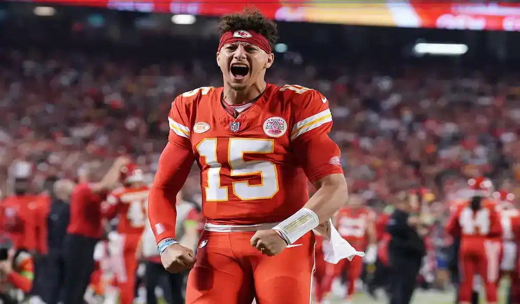 Kansas City Chiefs quarterback Patrick Mahomes celebrates after a play during a game against the Denver Broncos on October 29, 2023.