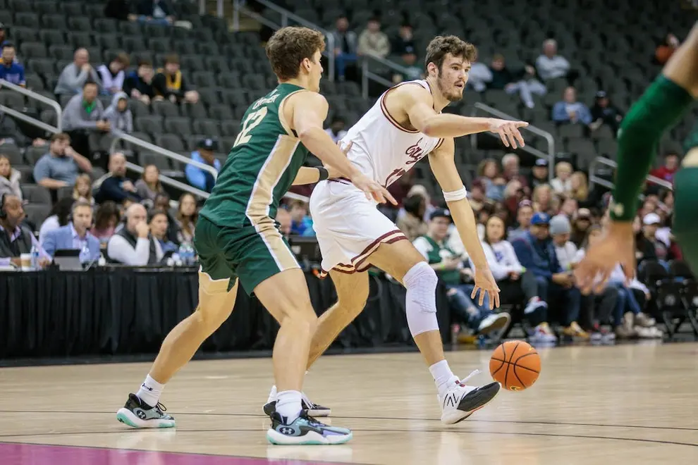 2 ncaab players from rival teams