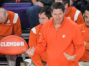 Clemson coach reacts on sideline during game.