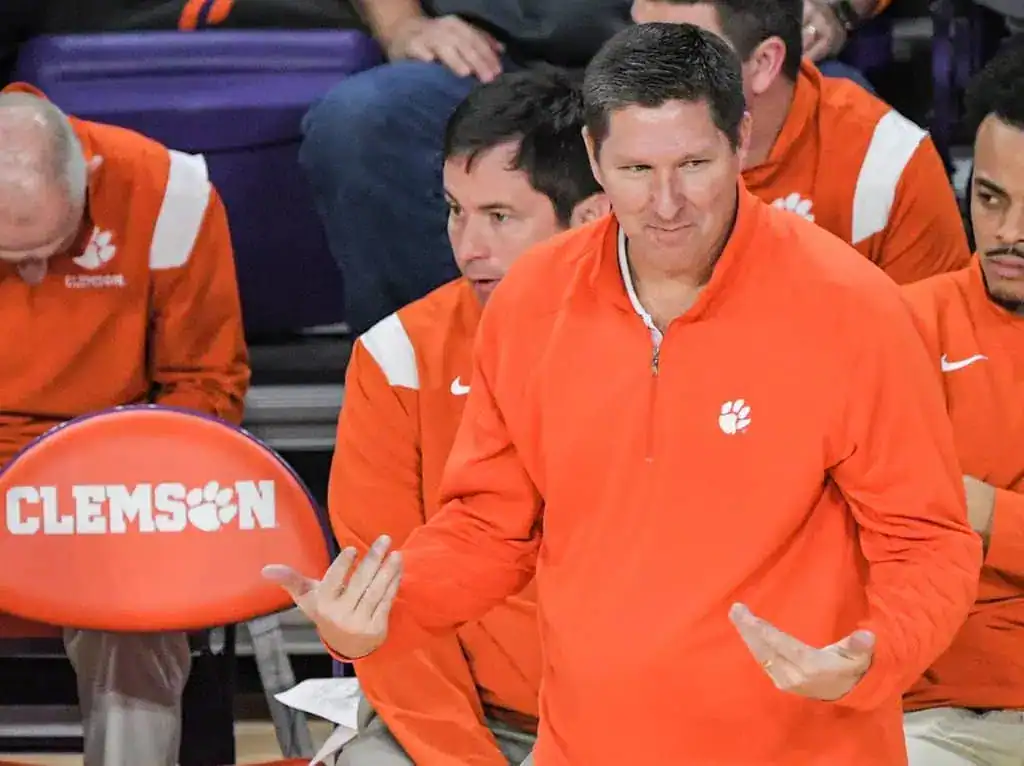Clemson coach reacts on sideline during game.