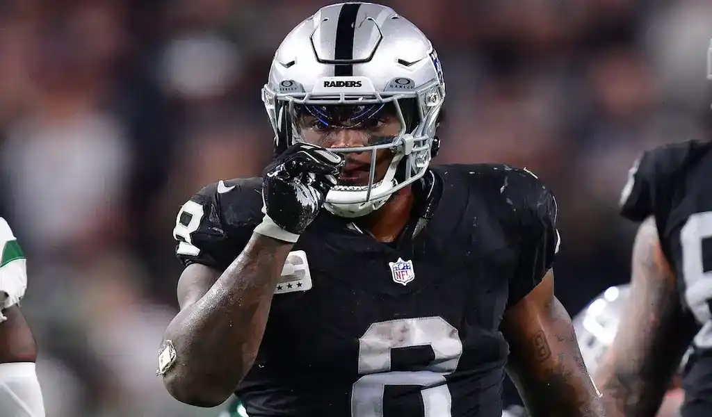3 Las Vegas Raiders player celebrates after a play during the November 19, 2023, game against the Miami Dolphins.