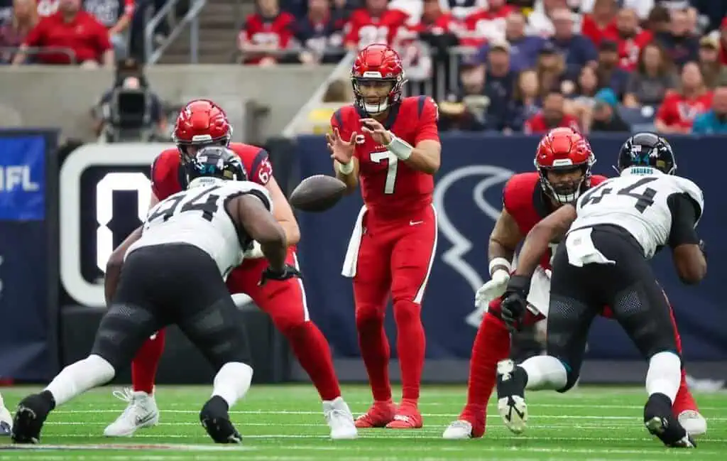9 High-stakes NFL moment with Houston Texans quarterback C.J. Stroud receiving the snap.