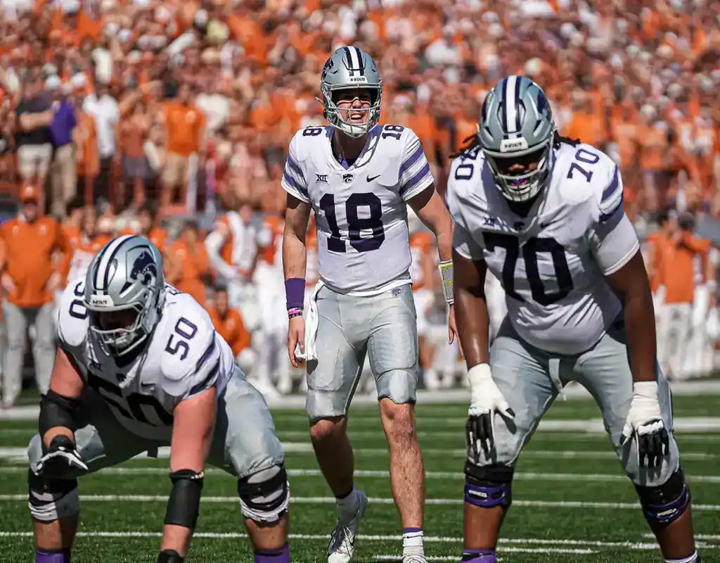 NCAAF 7 Kansas State Wildcats quarterback prepares for the snap during their game against the Baylor Bears on November 11, 2023