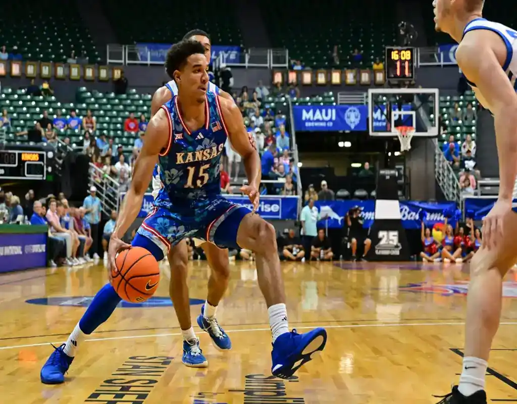 Kansas Jayhawks player drives to the basket during their November 22, 2023 game against the Tennessee Volunteers