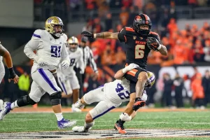 ncaaf player running from rivals
