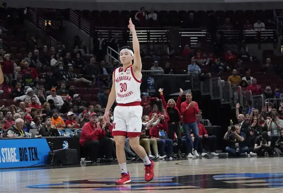 nebraska cornhuskers player pointing up