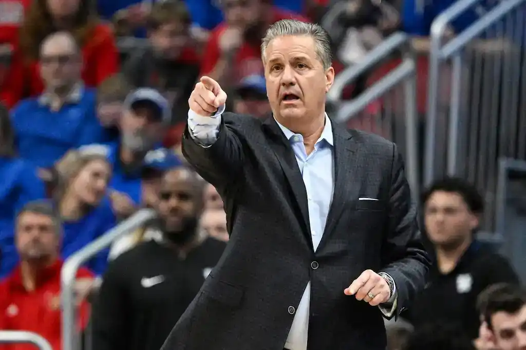 NCAAB COACH