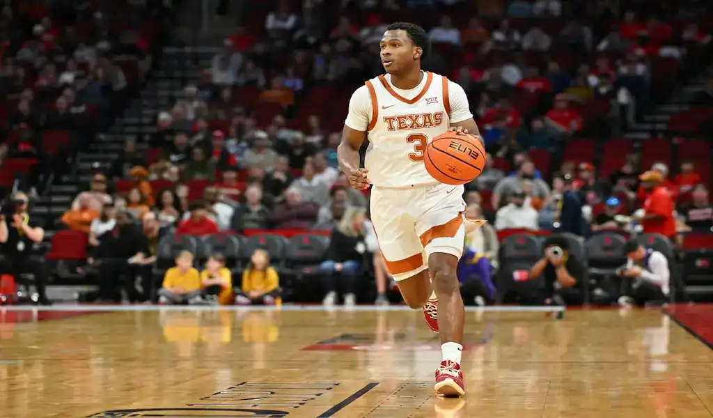 Texas Longhorns guard dribbles the basketball up the court during a game against NC Greensboro Spartans on December 29, 2023.