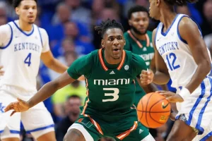 miami ncaab player preparing to chatch the ball