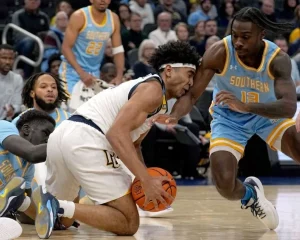 ncaab player stopping another players play