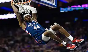 Philadelphia 76ers player hangs from rim after slam dunk against Atlanta Hawks