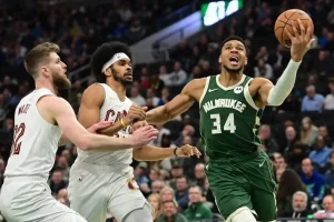 Milwaukee Bucks star Giannis Antetokounmpo, drives to the hoop for a layup.
