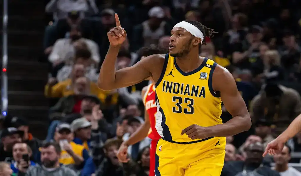 NBA matchup between Indiana Pacers and Boston Celtics on January 6, 2024, featuring a Pacers player celebrating on the court with fans in the background.