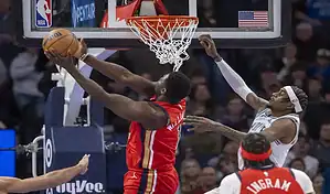 New Orleans Pelicans player Zion Williamson goes up for a dunk against the Los Angeles Clippers during a January 5, 2024, NBA game.