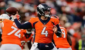 Denver Broncos quarterback throws a pass during the January 7, 2024, game against the Las Vegas Raiders.