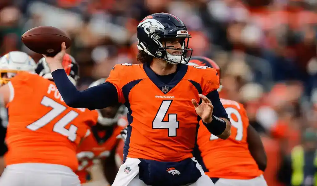 Denver Broncos quarterback throws a pass during the January 7, 2024, game against the Las Vegas Raiders.