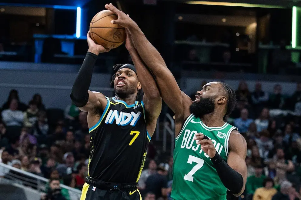 boston player blocking indiana player from shooting