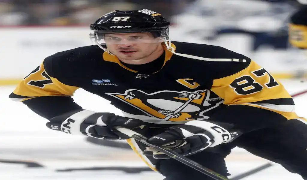 Pittsburgh Penguins player in action on the ice during an NHL game.