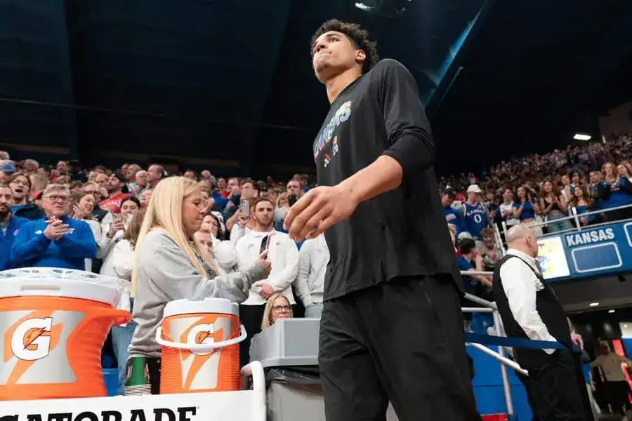 Kansas Jayhawks basketball player walking on the court during a game