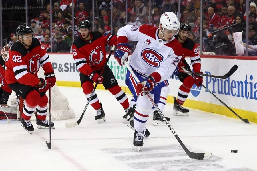 NHL 9 hockey players disputing the puck