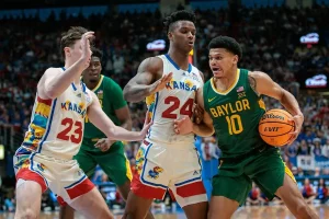 ncaab player blocking 2 rival players