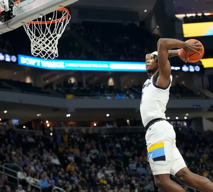 NCAAB 3 ncaab player slam dunking