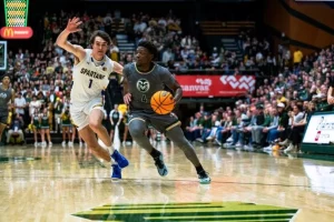 ncaab players facing off mid game