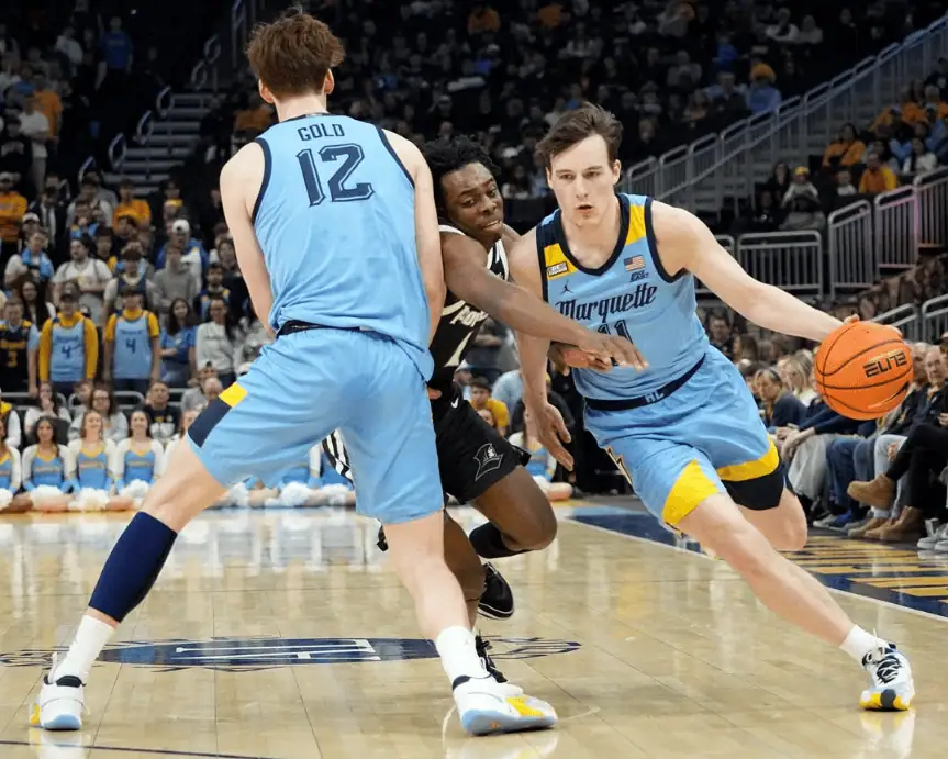 College basketball matchup between the Marquette Golden Eagles and Connecticut Huskies with expert pick and prediction for March 6th 2024.