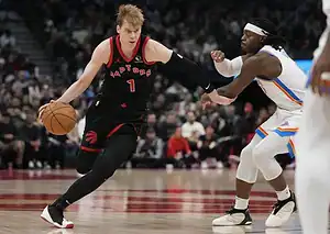 Toronto Raptors player in a black uniform dribbles the ball while being defended by an Oklahoma City Thunder player in a white jersey.