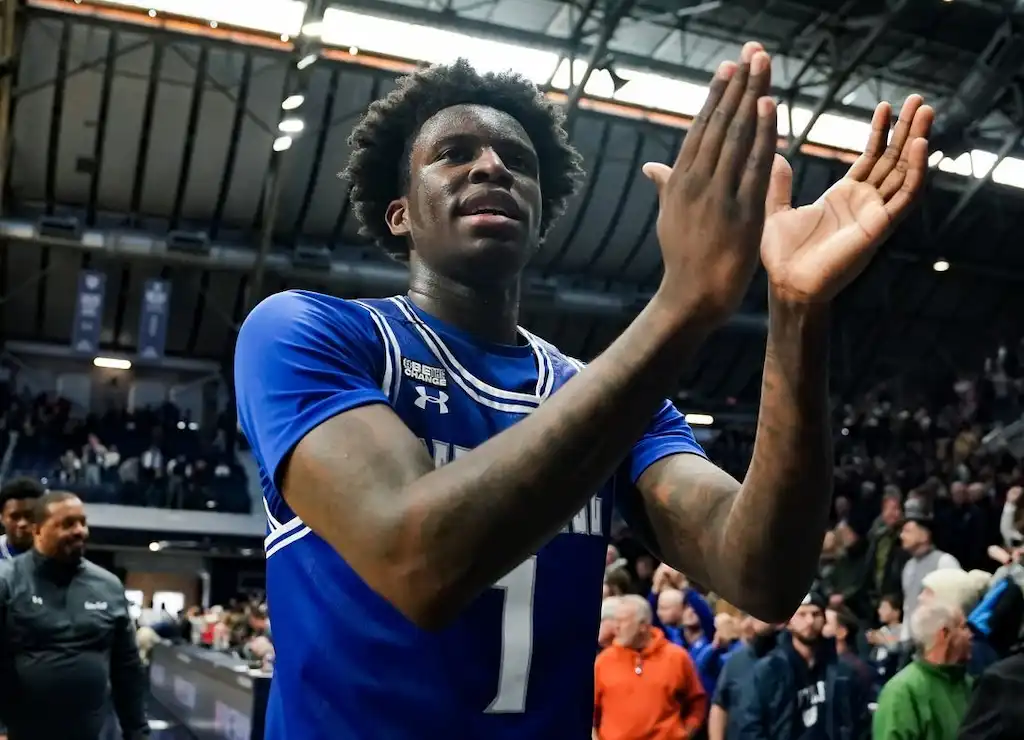 NCAAB 2 A Seton Hall player applauds while walking off the court.