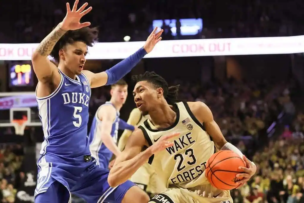 NCAAB 7 Heated college basketball matchup between the Duke Blue Devils and the Wake Forest Demon Deacons.