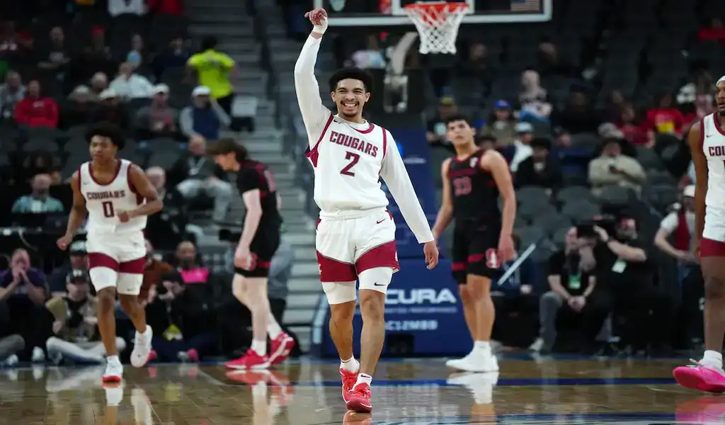 NCAAB 9 Washington State Cougars guard celebrates during a game against Colorado Buffaloes in March 2024