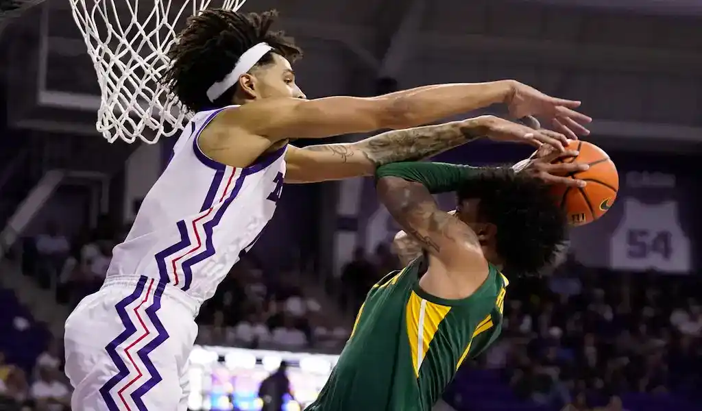 West Virginia vs Texas Christian basketball game preview with players in action on March 6th, 2024.