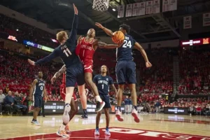 basketball player making a slam dunk