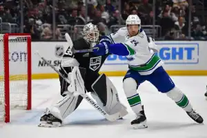 la kings goalie vs canucks player