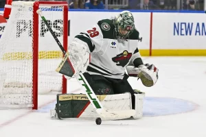 minnesota wilds goalkeeper guarding his net