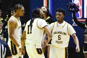 ncaab players celebrating a score
