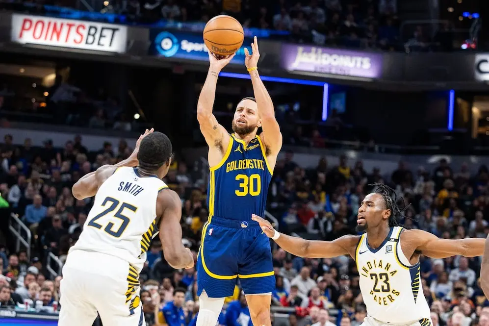 steph curry shooting for a 3 pointer