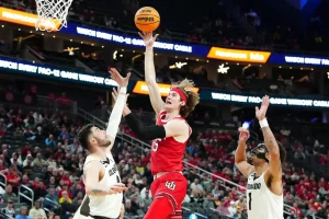 utah utes player jumping in attempt to score