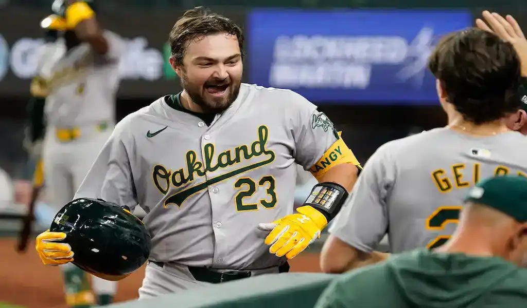 5 Oakland Athletics player celebrates after a hit during a game against the Texas Rangers on April 10, 2024.