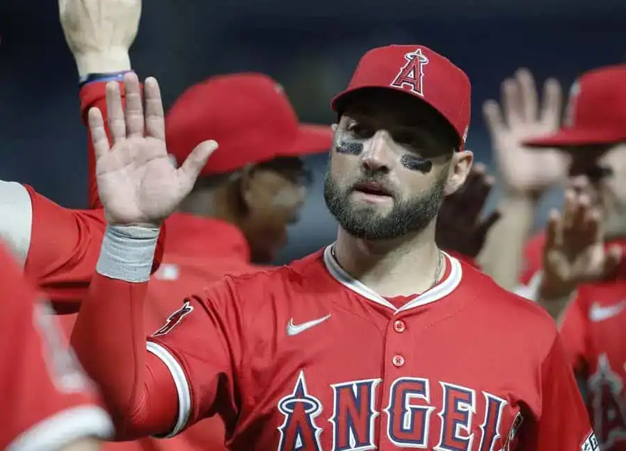 3 Jared Loughridge of the Angels celebrates with teammates after hitting a home run against the Rays on June 30, 2019.