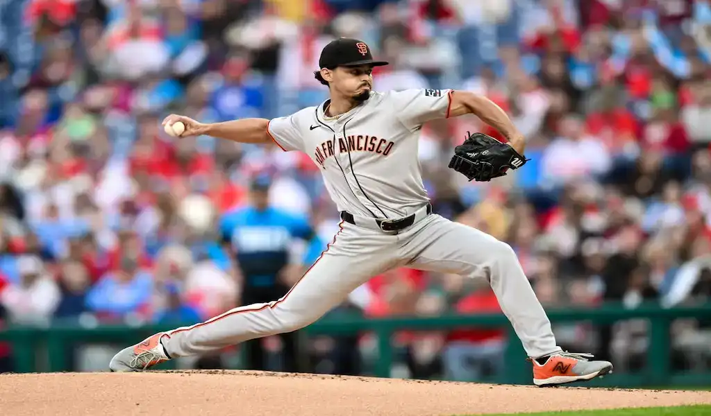 8 San Francisco Giants pitcher delivers a pitch during an MLB game against the Colorado Rockies.
