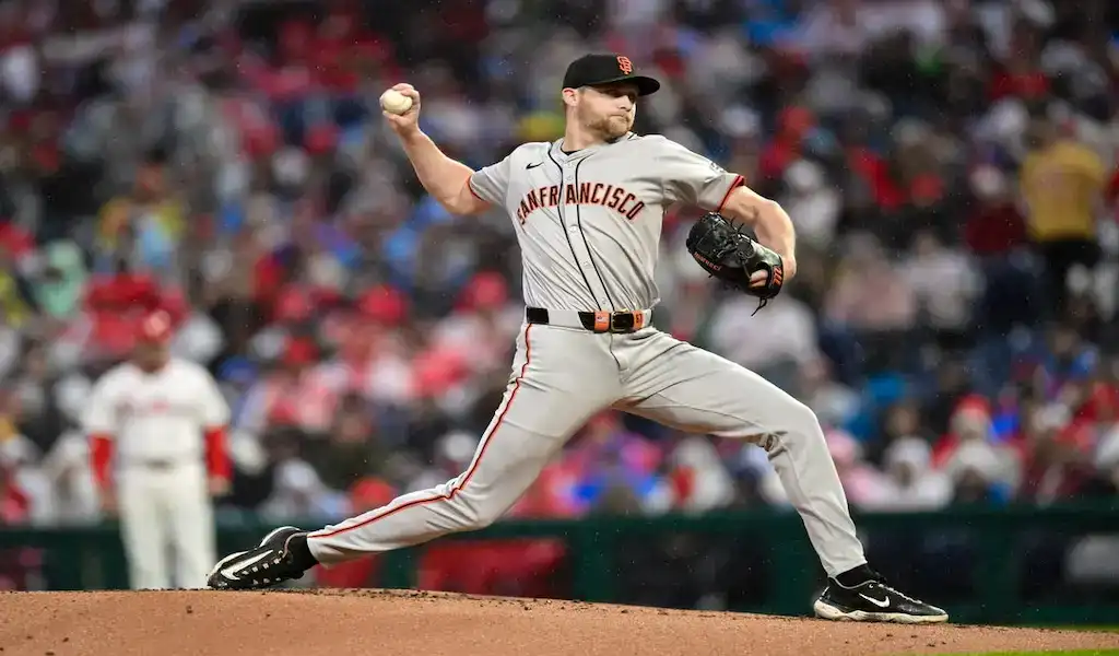 San Francisco Giants pitcher delivers a pitch during an MLB game against the Colorado Rockies.