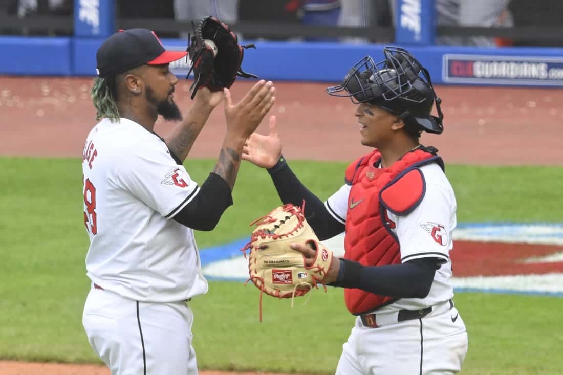 6 Cleveland Guardians greeting each other