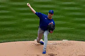 Chicago Cubs pitcher throws from the mound.