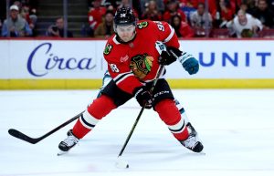 Blackhawks player dribbling