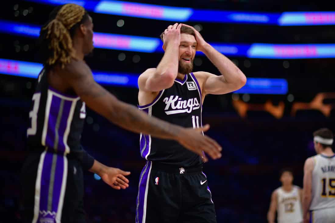9 Sabonis hands to head