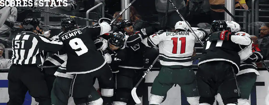 Minnesota Wild vs Nashville Predators Picks and Predictions December 31st 2024 4 NHL players from Kings and Wild involved in a scuffle near the boards during game