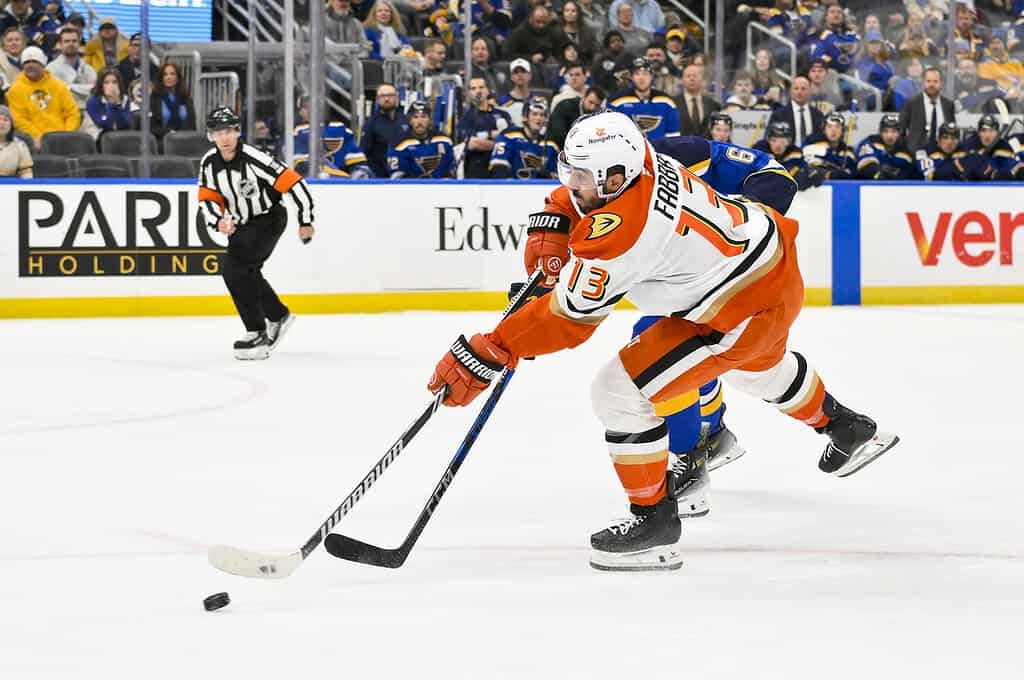 Ducks player dribbling
